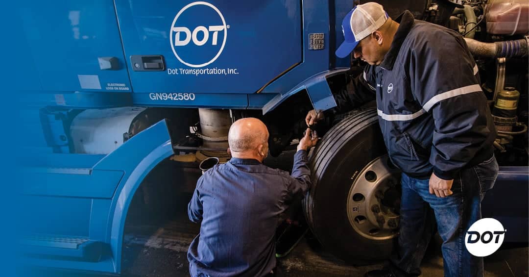 Dot Transportation garage technicians work on a truck