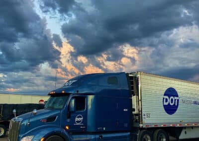 DTI truck with clouds and sky